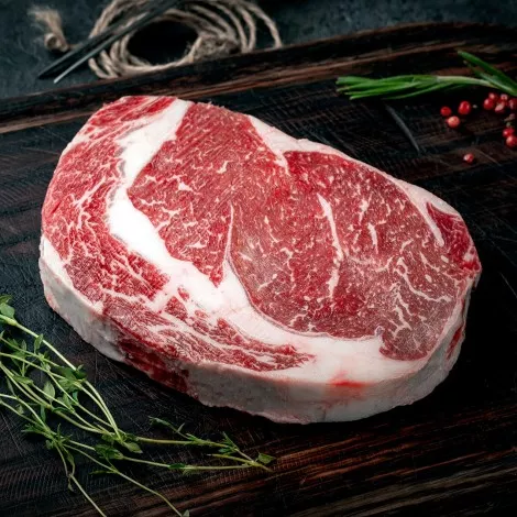 Young heifer rib eye steak premium marbling